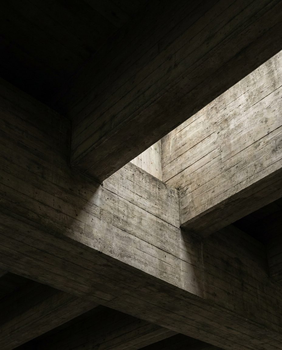 Board-marked concrete structure in raking light